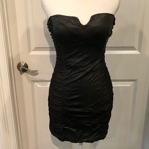 Black fitted BeBe strapless dress